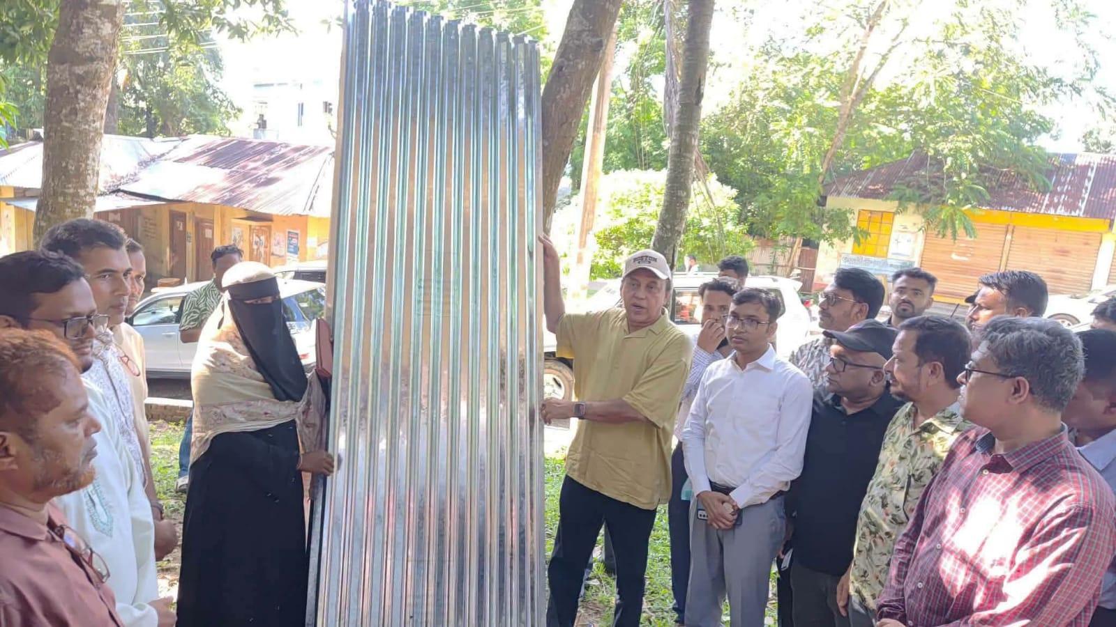 <h1>রামগড়ে সাম্প্রতিক প্রাকৃতিক দূর্যোগে ক্ষতিগ্রস্থ পরিবারের মাঝে ঢেউটিন ও চেক বিতরন</h1>